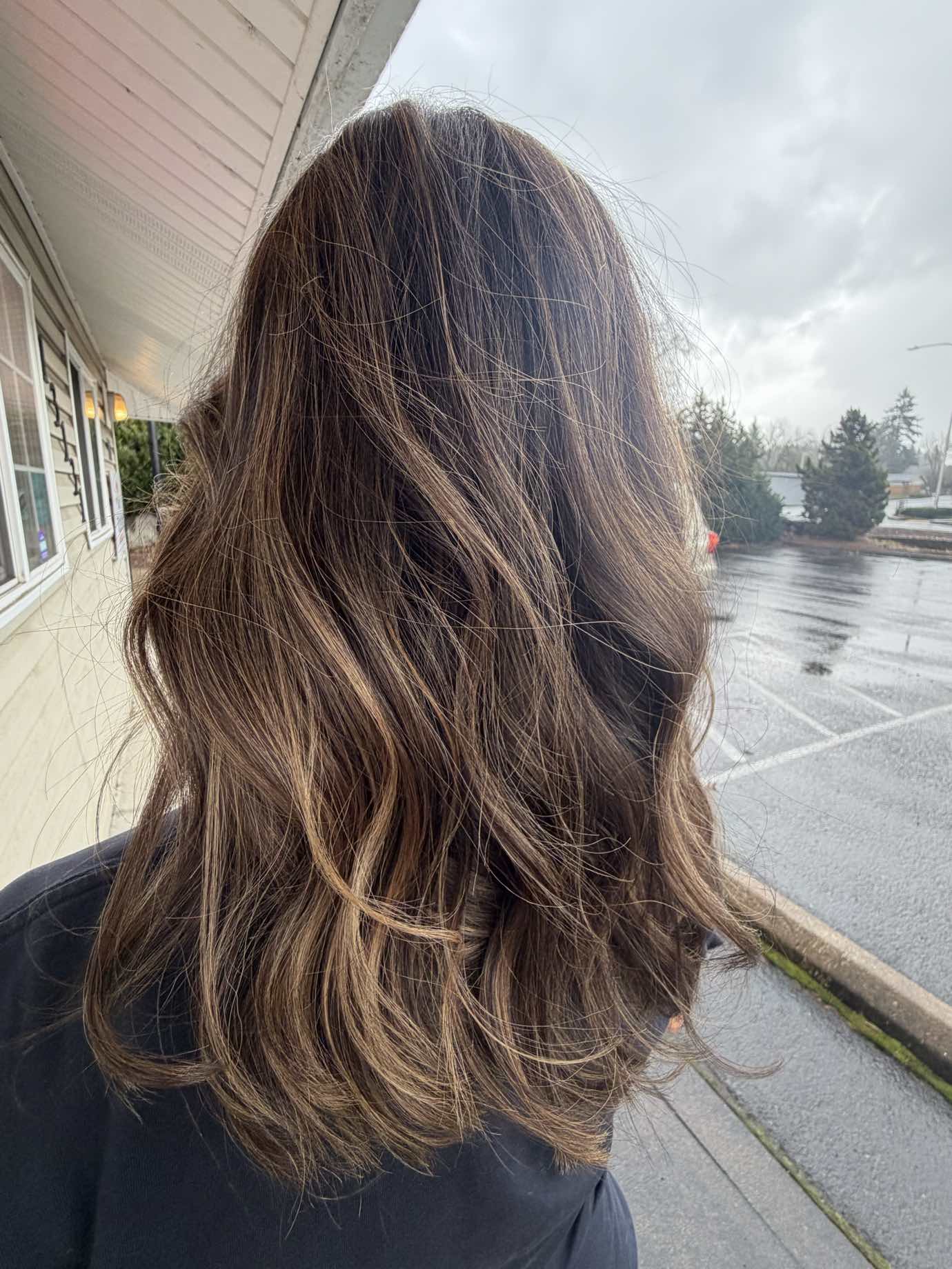 Brunette hair with caramel balayage and soft waves