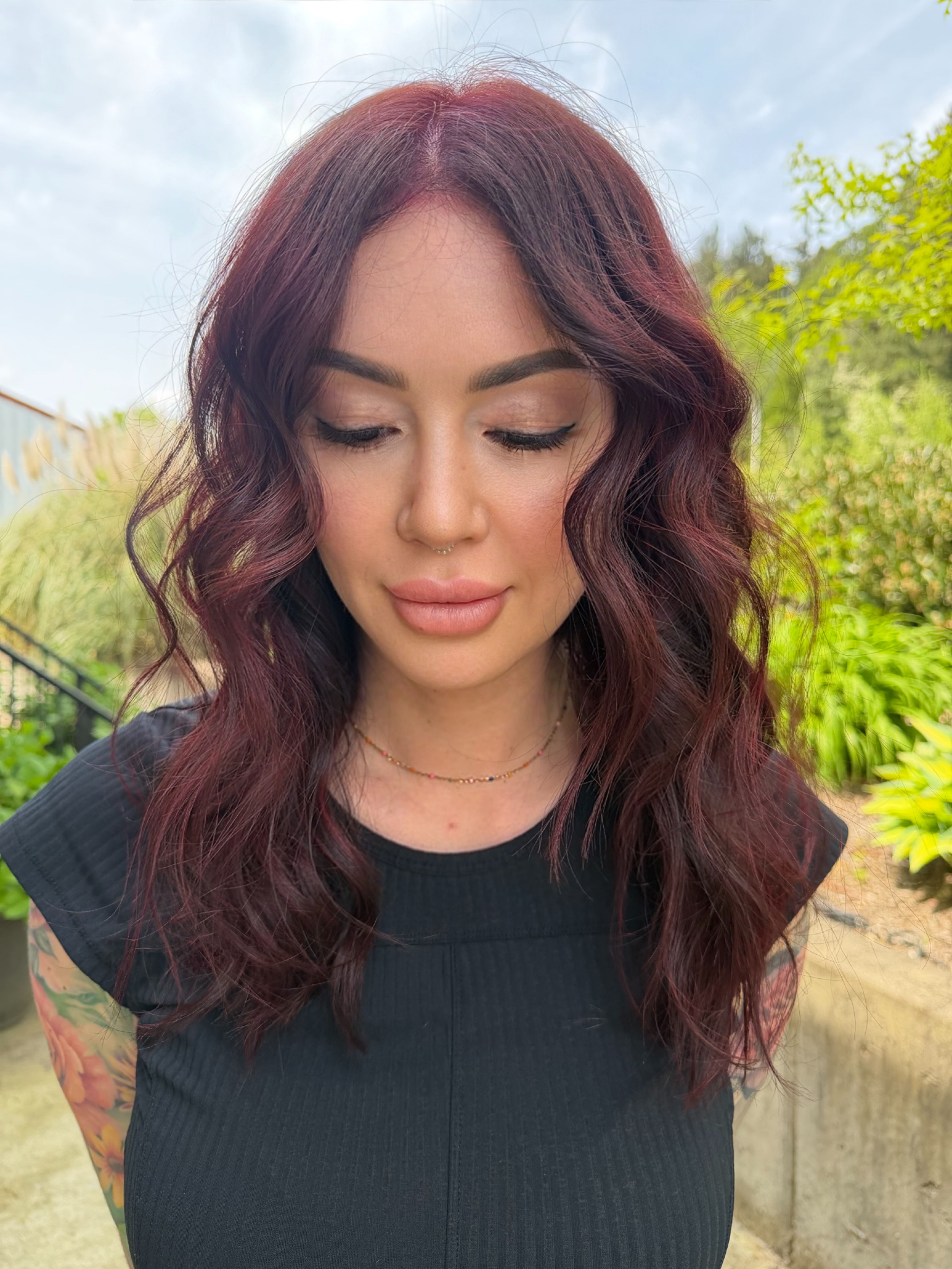 Rich mahogany red hair with face-framing waves